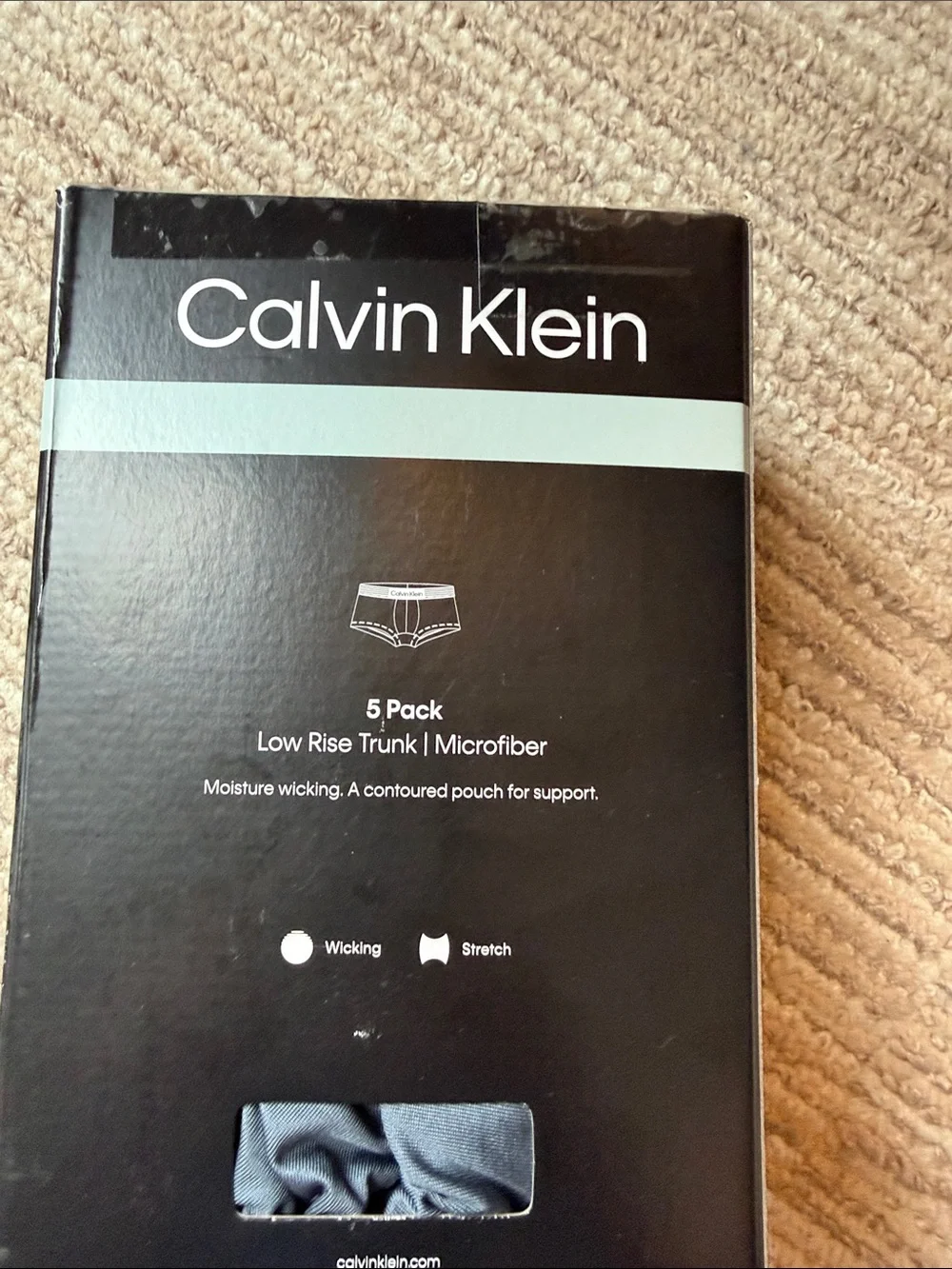 Calvin Klein Black Low-Rise Trunks (4) with Striped Waistband.